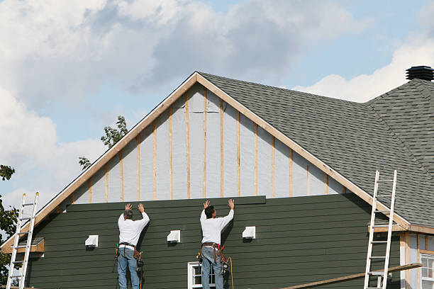 Professional Siding Contractor technician working in Cranesville, PA